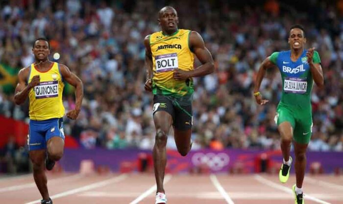 Álex Quiñónez (izquierda) quedó séptimo en la final de 200 metros en los Juegos Olímpicos de Tokio, en 2012. Tuvo de rival al legendario jamaiquino Usain Bolt (centro). Foto: archivo / EFE
