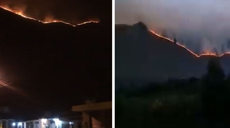 La línea del fuego generada por el incendio forestal en el cerro Caparina se observaba desde la vía Pifo- Papallacta. Foto: Captura de pantalla