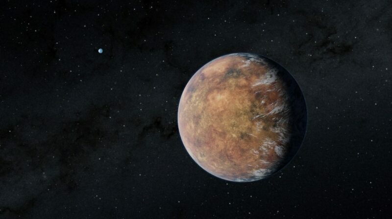 El planeta TOI 700 e, del tamaño de la Tierra, recientemente descubierto, orbita en la zona habitable de su estrella. Su hermano del tamaño de la Tierra, TOI 700 d, puede verse en la distancia. Foto: Europa Press.