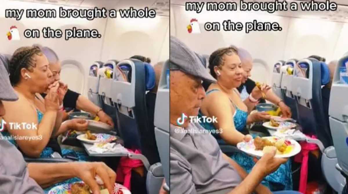 Una familia reparte pollo frito en el interior de un avión. Foto: Captura del video